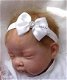 Baby dior haarband met satijnen strik in wit of roze - 1 - Thumbnail