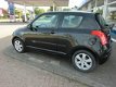 Suzuki Swift - 1.3 Exclusive AUTOMAAT/ LEER - 1 - Thumbnail