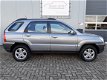 Kia Sportage - 2.0 CVVT Comfort Airco/Trekhaak/16inch - 1 - Thumbnail