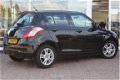 Suzuki Swift - 1.2 94pk 5d Comfort - RIJKLAAR - 1 - Thumbnail