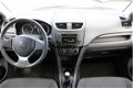 Suzuki Swift - 1.2 94pk 5d Comfort - RIJKLAAR - 1 - Thumbnail