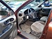Hyundai Santa Fe - 2.7i V6 4WD Style Automaat Clima Elektr Ramen Laag KM Cruise Contr LMV Trekhaak N - 1 - Thumbnail