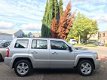 Jeep Patriot - 2.4 Sport Liberty 4x4/Airco/Nette - 1 - Thumbnail