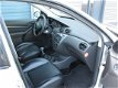 Ford Focus - 1.6-16V Futura+Airco/Leder/Navi/ Nieuwe APK 30-11-2020 - 1 - Thumbnail