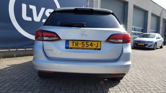 Opel Astra Sports Tourer - 1.0 Online Edition - NAVI - AIRCO ECC - PDC VOOR + ACHTER - CRUISE - 1