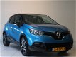 Renault Captur - 1.2 TCe Dynamique/Clima/Navi/PDC/Stoelverwarming /Zeer compleet - 1 - Thumbnail