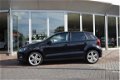 Volkswagen Polo - 1.2 TSI BlueMotion R-Line Edition, Navi, Cruise control, PDC Nieuwjaarsactie van € - 1 - Thumbnail