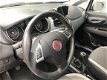 Fiat Punto Evo - 1.3 M-Jet Easy / Weinig kilometers (clim.C / LMV / MF lederen stuurwiel / Tomtom / - 1 - Thumbnail