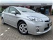 Toyota Prius - 1.8 Comfort ✅ Hybrid Automaat / Climate Control / Keyless Entry - 1 - Thumbnail