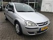 Opel Corsa - 1.2-16V Rhythm NIEUWE APK - 1 - Thumbnail