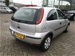 Opel Corsa - 1.2-16V Rhythm NIEUWE APK - 1 - Thumbnail