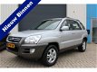 Kia Sportage - 2.0 CRDi Adventure 4WD, Automaat, Half Leer, LMV, Clima - 1 - Thumbnail