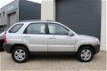 Kia Sportage - 2.0 CRDi Adventure 4WD, Automaat, Half Leer, LMV, Clima - 1 - Thumbnail