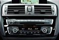 BMW 1-serie - 118i, Full LED, M-stuur, Sportstoelen, Automaat, EDE Corp. Lease Essential 2016 - 1 - Thumbnail