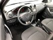 Dacia Sandero - TCe 90pk Lauréate Navig., Airco, Cruise, 15'' Lichtm. velg - 1 - Thumbnail