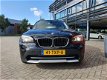 BMW X1 - 2.0i sDrive Business 1e eigenaar - 1 - Thumbnail