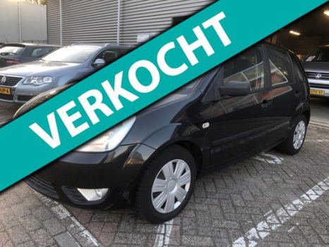 Ford Fiesta - 1.4-16V Ghia 5-deurs airco elektrische ramen parkeersensoren navigatie parrot apk 12-0 - 1