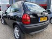 Opel Corsa - 1.4i Swing APK Zwart Leuke Auto - 1 - Thumbnail