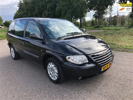 Chrysler Voyager - 2.4i SE Airco Cruise control Luxe Benzine 7 persoons - 1