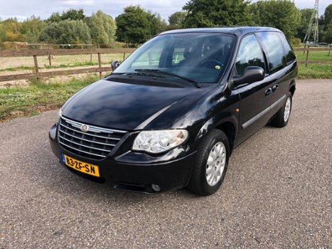 Chrysler Voyager - 2.4i SE Airco Cruise control Luxe Benzine 7 persoons - 1