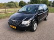 Chrysler Voyager - 2.4i SE Airco Cruise control Luxe Benzine 7 persoons - 1 - Thumbnail