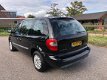 Chrysler Voyager - 2.4i SE Airco Cruise control Luxe Benzine 7 persoons - 1 - Thumbnail