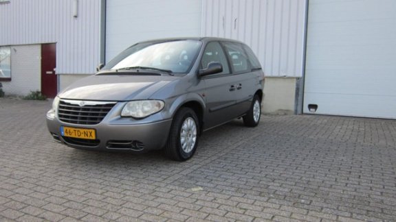 Chrysler Voyager - 2.4i SE Luxe 7persoons - 1