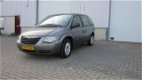 Chrysler Voyager - 2.4i SE Luxe 7persoons - 1 - Thumbnail