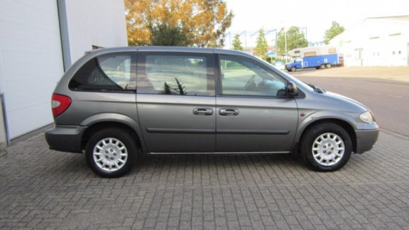 Chrysler Voyager - 2.4i SE Luxe 7persoons - 1