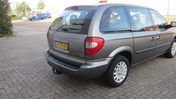 Chrysler Voyager - 2.4i SE Luxe 7persoons - 1