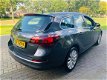 Opel Astra Sports Tourer - 1.4 T140PK COSMO ECC NAV PDC - 1 - Thumbnail