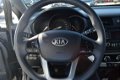 Kia Rio - 1.2 85pk Comfort Pack LMV/Airco - 1 - Thumbnail