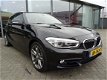 BMW 1-serie - 118i 136PK AUTOMAAT Corporate Lease Sport AIRCO-ECC / NAVI / *NEDERLANDSE AUTO-DEALER - 1 - Thumbnail