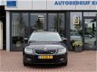 Skoda Octavia Combi - 1.6 TDI Businessline | groot navi | xenon | parkeersensoren | - 1 - Thumbnail