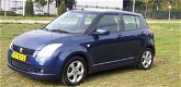 Suzuki Swift - 1.3 GA Dealer onderhouden stoel verwarming airco navi cv op afs elekramen stuurbkr - 1 - Thumbnail