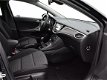 Opel Astra - ST Online Edition 1.4T 150PK NAVI/CLIMA/PDC V+A - 1 - Thumbnail