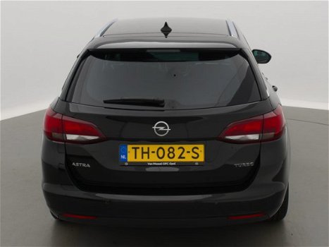 Opel Astra - ST Online Edition 1.4T 150PK NAVI/CLIMA/PDC V+A - 1