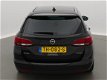 Opel Astra - ST Online Edition 1.4T 150PK NAVI/CLIMA/PDC V+A - 1 - Thumbnail