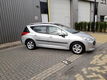 Peugeot 207 SW - 1.4 VTi Blue Lease Airco Panoramadak Grijs - 1 - Thumbnail