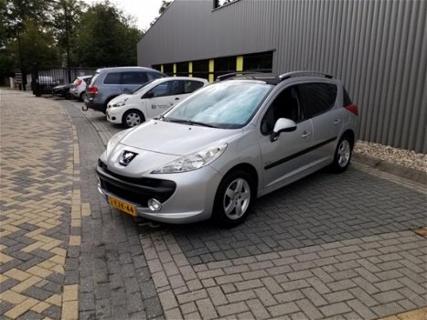 Peugeot 207 SW - 1.4 VTi Blue Lease Airco Panoramadak Grijs - 1