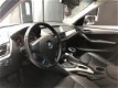 BMW X1 - 1.8d xDrive Exec. 2010 Automaat Leer Stoelverm - 1 - Thumbnail