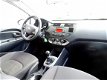 Kia Rio - 1.2 CVVT 5drs (airco, navi, aux) - 1 - Thumbnail