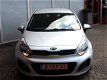 Kia Rio - 1.2 CVVT 5drs (airco, navi, aux) - 1 - Thumbnail