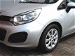 Kia Rio - 1.2 CVVT 5drs (airco, navi, aux) - 1 - Thumbnail