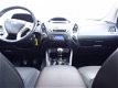 Hyundai ix35 - 1.6i GDI Business Style+ (leer, navi, xenon, pdc) - 1 - Thumbnail
