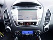 Hyundai ix35 - 1.6i GDI Business Style+ (leer, navi, xenon, pdc) - 1 - Thumbnail