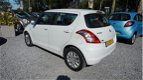 Suzuki Swift - 1.2 Comfort 5deurs airco parlemoer wit metallic zeer mooie auto - 1 - Thumbnail