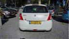 Suzuki Swift - 1.2 Comfort 5deurs airco parlemoer wit metallic zeer mooie auto - 1 - Thumbnail