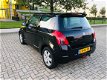 Suzuki Swift - 1.3 Base Boekjes, AIRCO, APK - 1 - Thumbnail