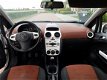 Opel Corsa - 1.4i Sport SATELLITE uitvoering uit 2012 - 1 - Thumbnail